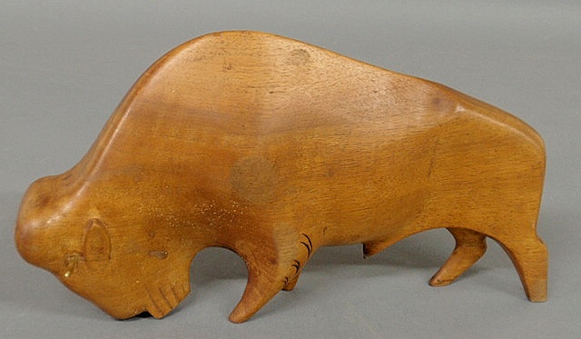 Appraisal: Carved wood bison with brass horns body stamped Hagenauer and