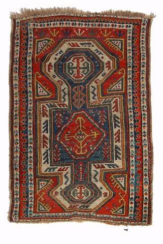 Appraisal: A CAUCASIAN RED GROUND MAT decorated a geometrical motif within