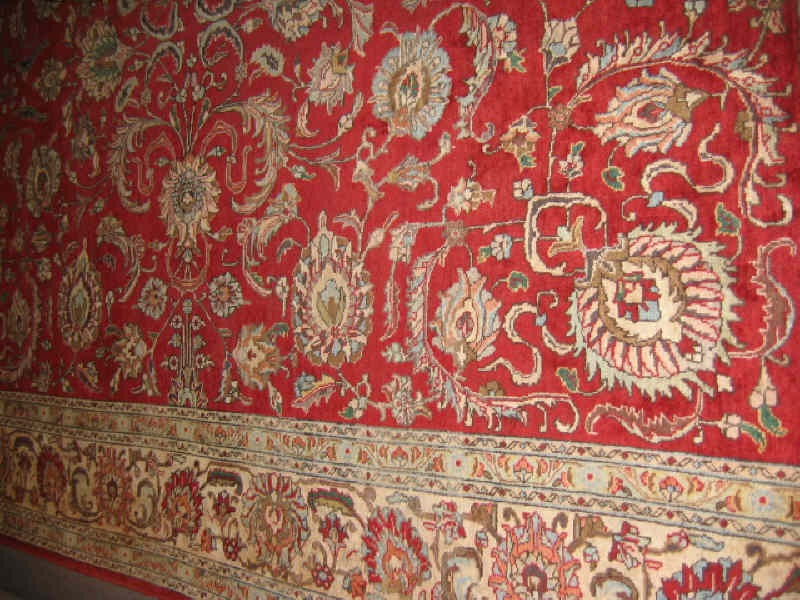 Appraisal: TABRIZ ROOM RUG The red field shows an allover harshang