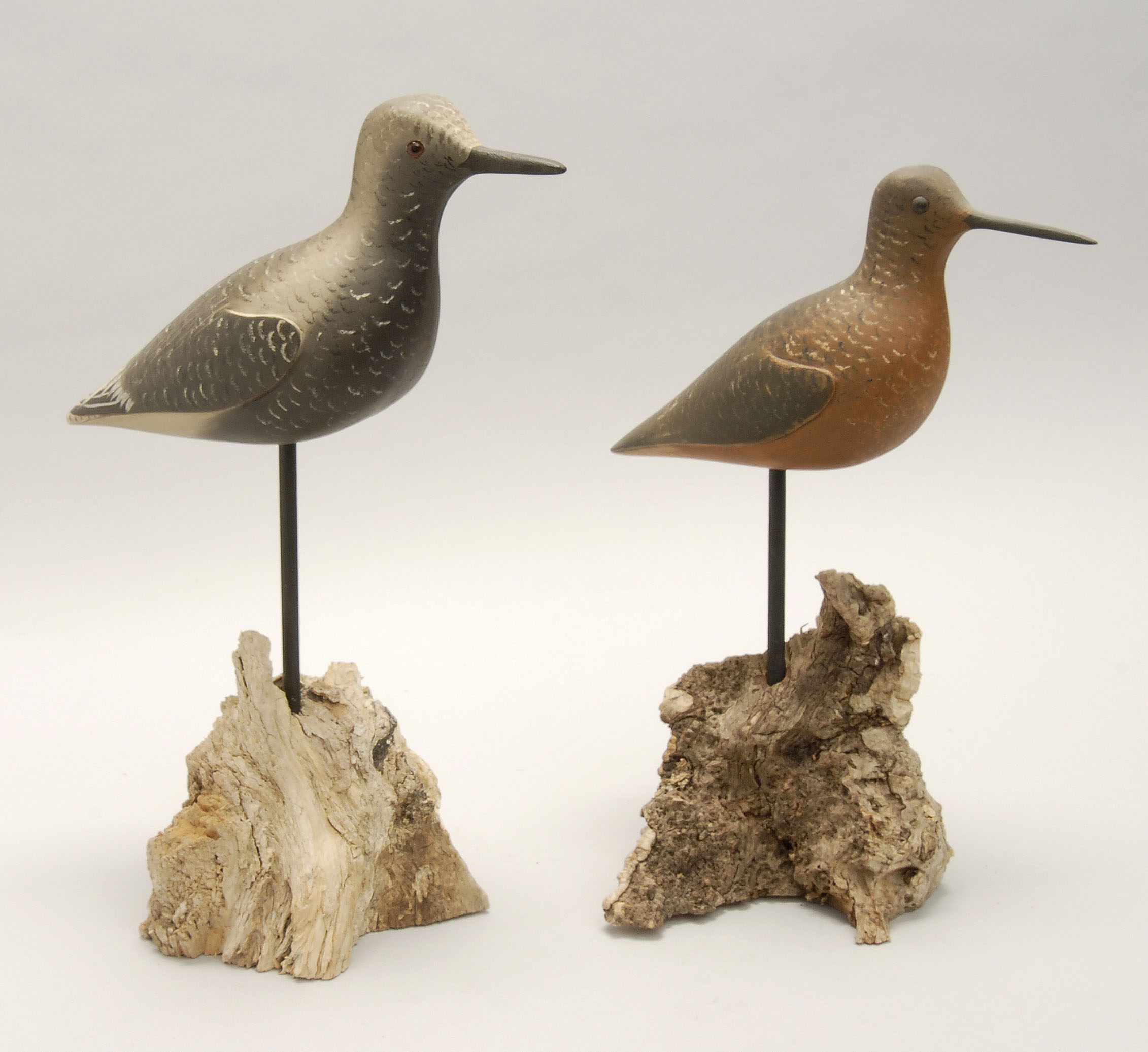 Appraisal: TWO CONTEMPORARY SHOREBIRD DECOYS A black-bellied plover and a robin