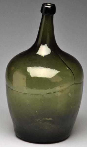 Appraisal: Green Demijohn Bottle Description Circa Olive green onion-type demijohn bottle