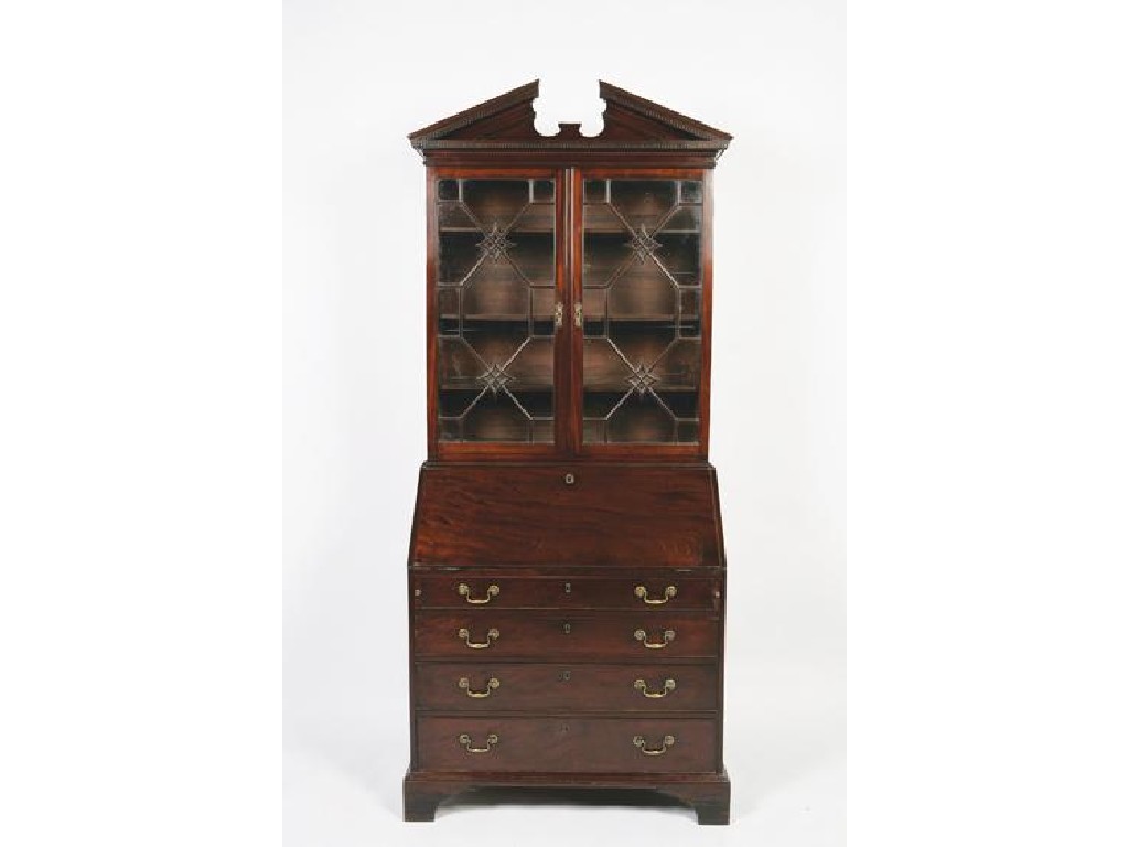 Appraisal: A GEORGE III MAHOGANY BUREAU BOOKCASE the upper section with