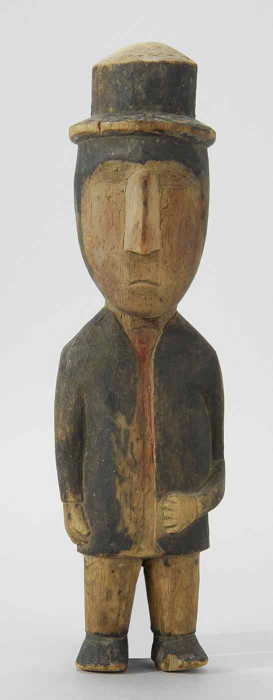 Appraisal: RARE FOLK ART CARVED AND PAINTED WOODEN FIGURE OF A