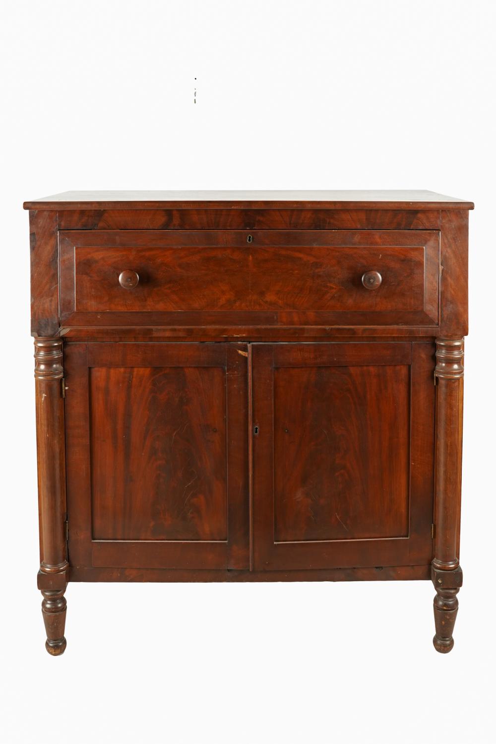 Appraisal: AMERICAN LATE CLASSICAL MAHOGANY CABINET th century having a drawer