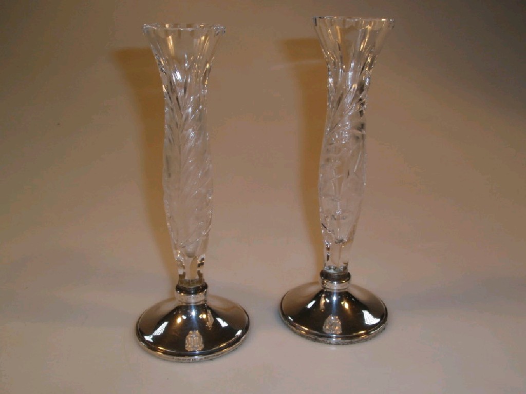 Appraisal: A pair of cut glass bud vases of slender baluster