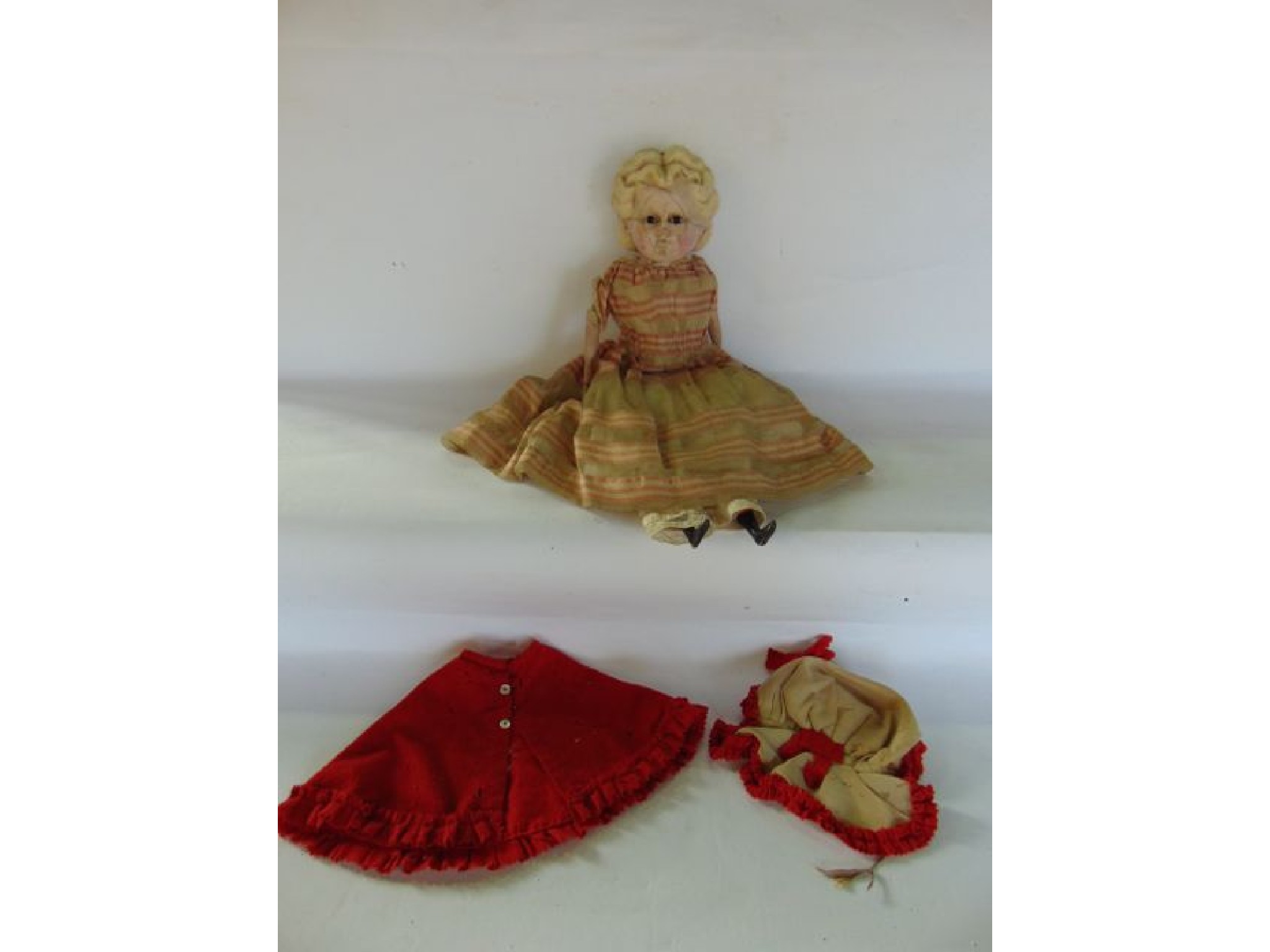 Appraisal: An unusual antique doll with wax coated composition head with