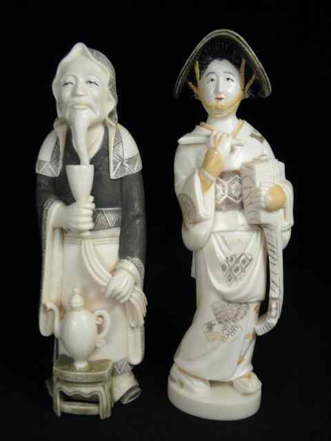 Appraisal: Pair of Japanese carved ivory figures Includes a sage or