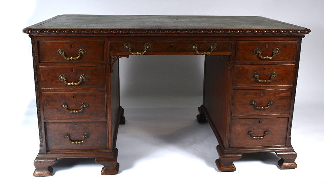 Appraisal: A th Century mahogany pedestal deskfitted nine drawers with inset