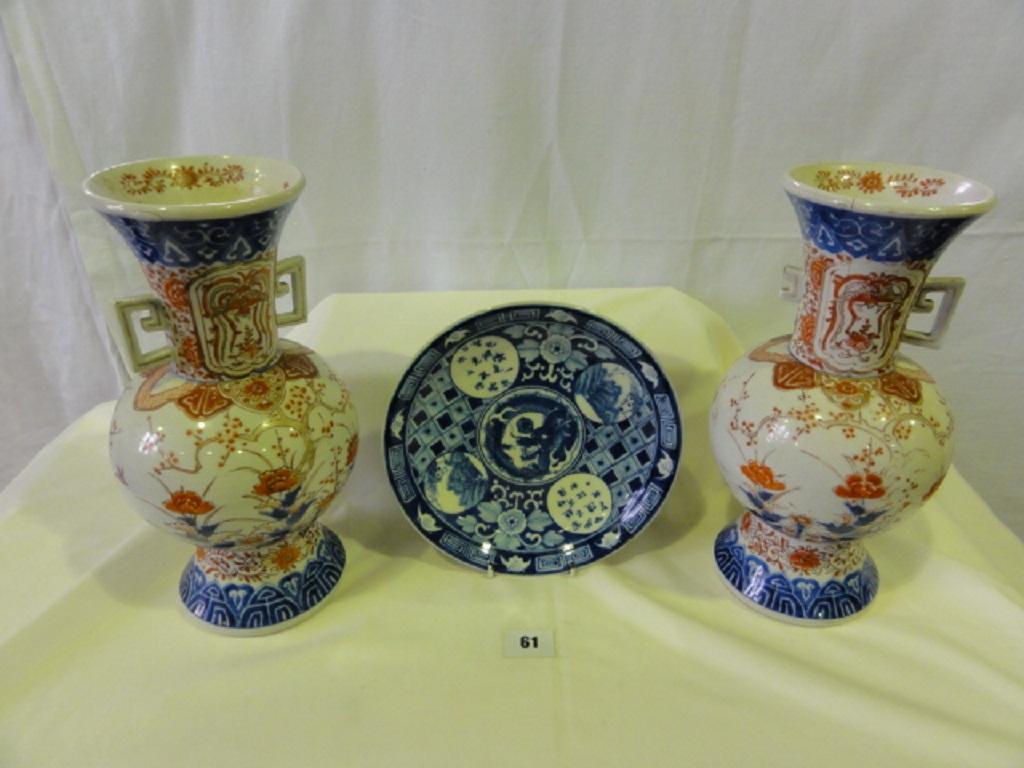 Appraisal: A pair of th century Imari two handled vases with