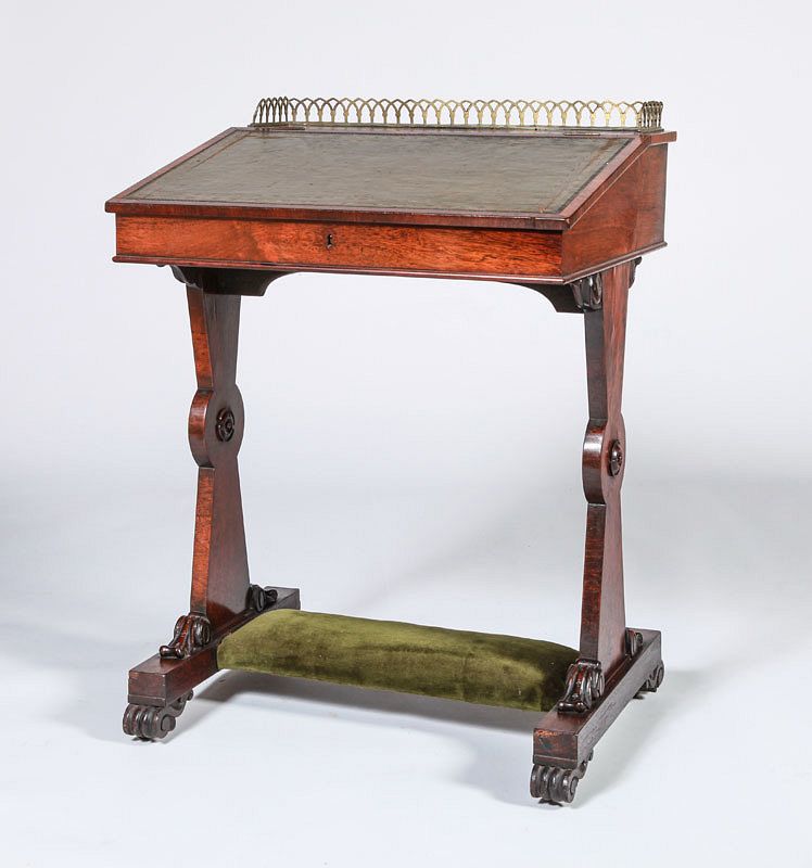 Appraisal: Victorian Rosewood Student's Desk The slant front writing surface opening