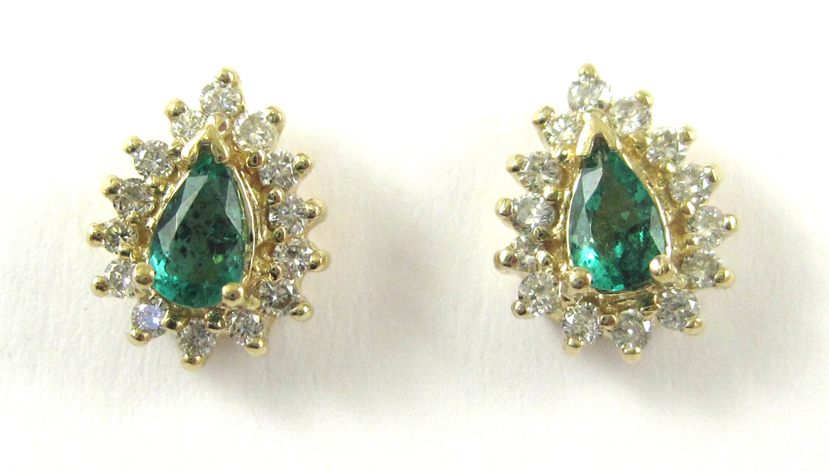 Appraisal: PAIR OF EMERALD AND DIAMOND EARRINGS each k yellow gold