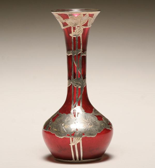 Appraisal: A Nouveau art glass vase with sterling overlay the cranberry