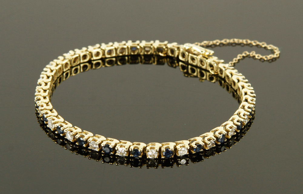 Appraisal: - K Gold Diamond and Sapphire Bracelet K yellow gold