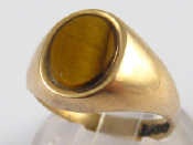 Appraisal: A carat gold tiger's eye ring size O gms