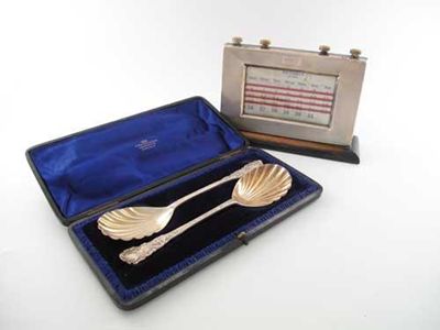 Appraisal: A pair of Victorian silver fruit serving spoons by G