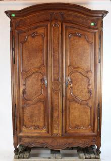 Appraisal: French Provincial armoire in burled walnut th century French Provincial