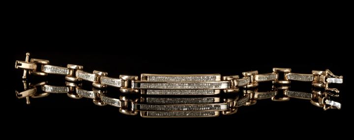 Appraisal: Unusual Retro-Moderne Fourteen-Karat Rose Gold and Diamond Link Bracelet ca