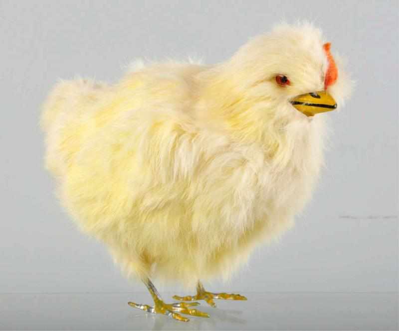 Appraisal: Rabbit Fur-Covered Chick Candy Container With glass eyes and metal