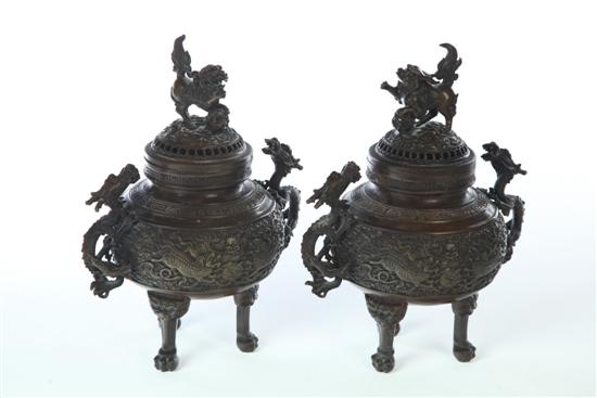 Appraisal: PAIR OF BRONZE CENSERS China th century Cast bronze with