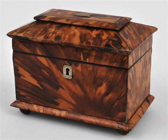 Appraisal: A small tortoiseshell tea caddy Circa The sarcophagus shaped caddy