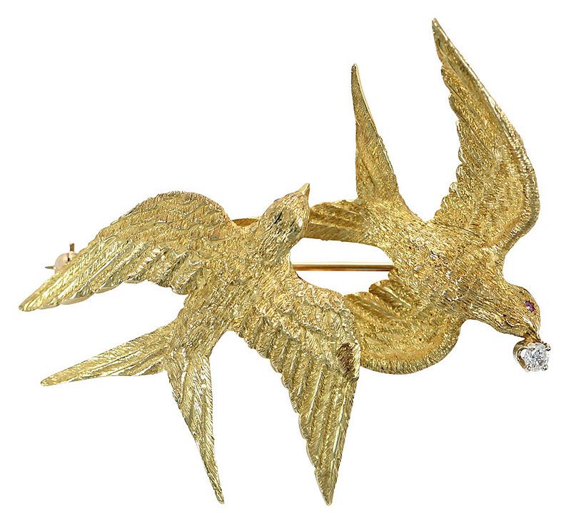 Appraisal: kt Bird Brooch two swallows flying one round brilliant diamond