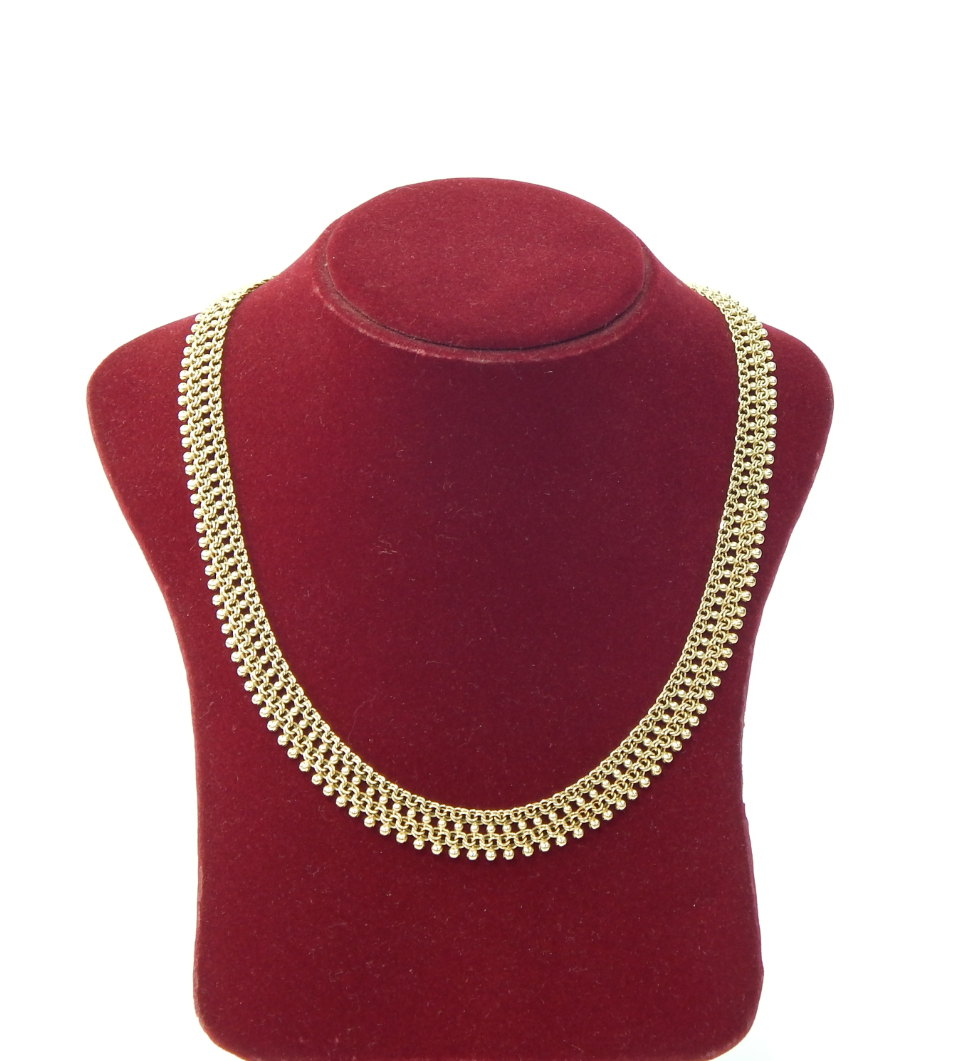 Appraisal: A yellow metal bead and chain link collar necklace on