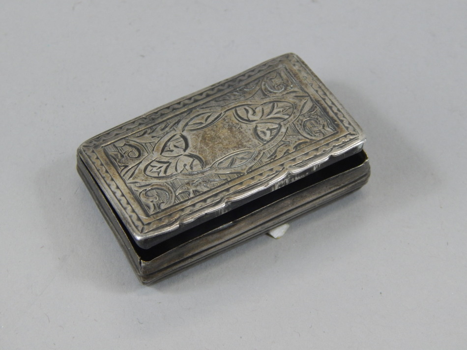 Appraisal: A Victorian rectangular silver vesta case with engraved decoration Birmingham