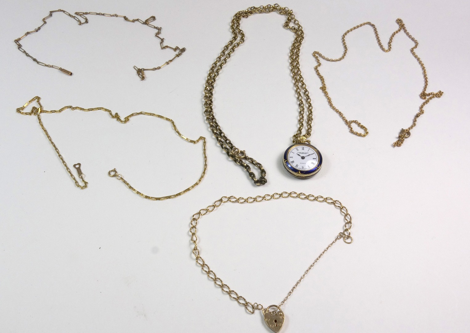 Appraisal: A collection of chains and a fob watch comprising a