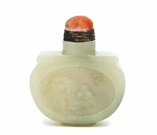 Appraisal: A Jade Snuff Bottle having relief carving of two seated