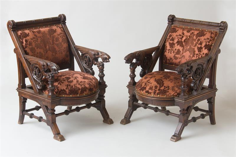 Appraisal: PAIR OF WALNUT GOTHIC REVIVAL-STYLE ARMCHAIRS DESIGNED BY JOAN BUSQUETS