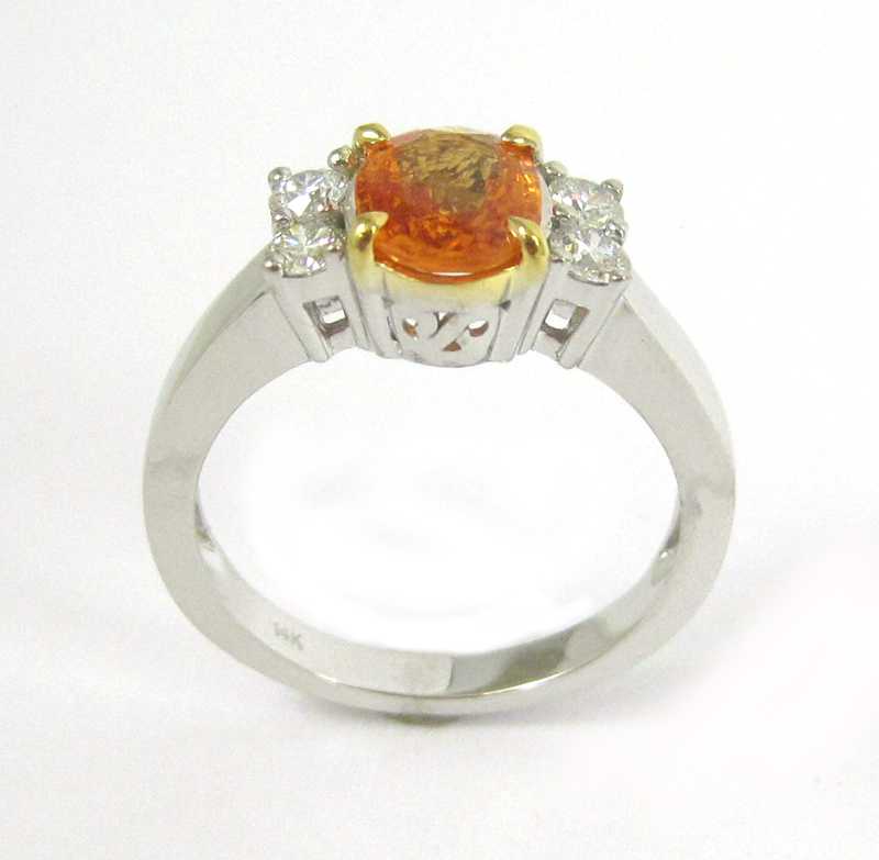 Appraisal: ORANGE SAPPHIRE AND DIAMOND RING k white and yellow gold