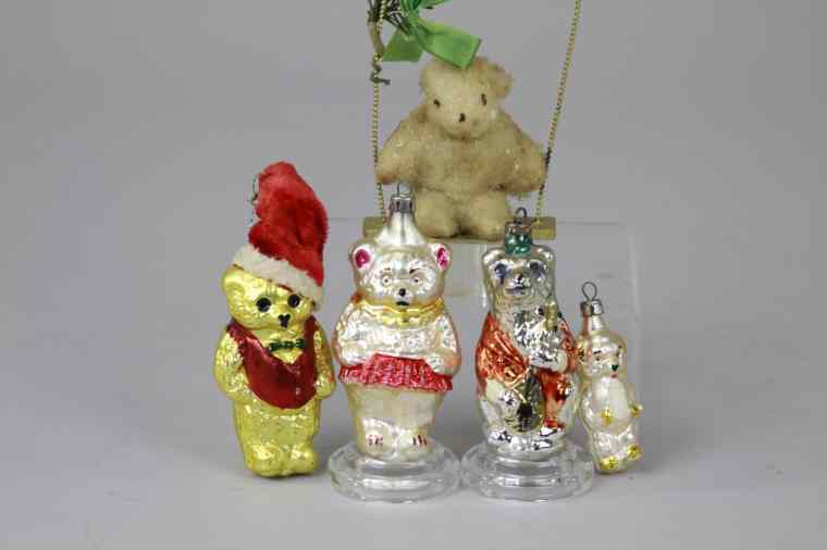 Appraisal: FIVE CHRISTMAS TREE ORNAMENTS Germany consists of covered snow bear