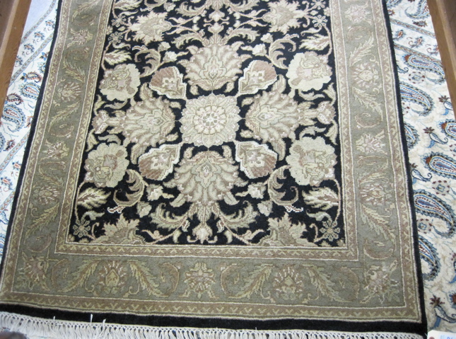 Appraisal: HAND KNOTTED ORIENTAL CORRIDOR CARPET Indo-Persian overall floral pattern on