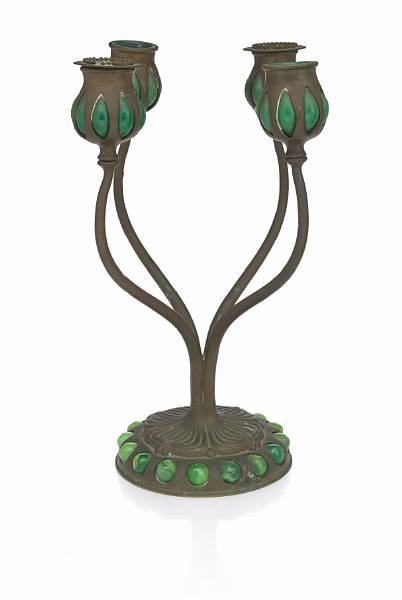 Appraisal: A Tiffany Studios blown-out glass and bronze four-light candlestick -