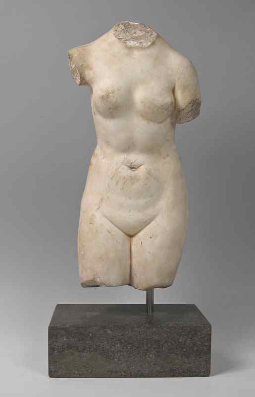 Appraisal: APHRODITE MARBLE TORSO SCULPTURE th Century '' h Affixed to