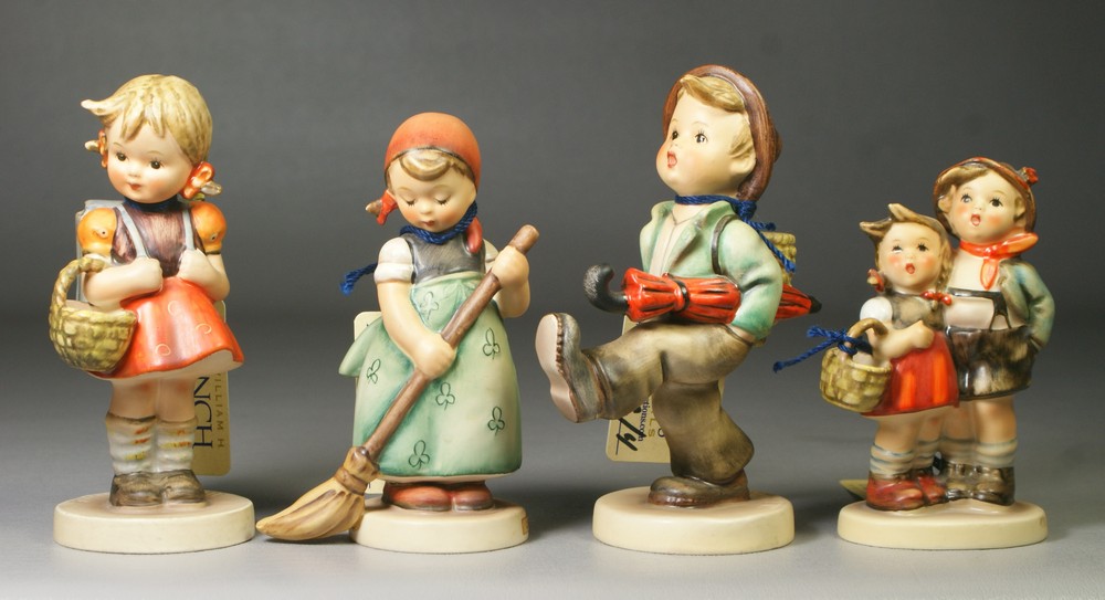 Appraisal: Hummel figurines Globe Trotter Hum Little Sweeper Hum School Girl