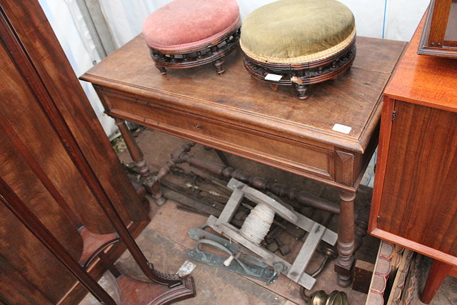 Appraisal: A CONTINENTAL WALNUT SIDE TABLE with single frieze drawers standing