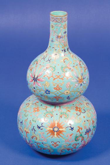 Appraisal: A CHINESE DOUBLE-GOURD VASE decorated in polychrome and gilt on