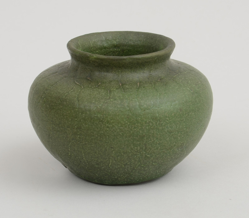 Appraisal: GRUEBY GREEN-GLAZED POTTERY BOWL Mark very rubbed with crackle surface