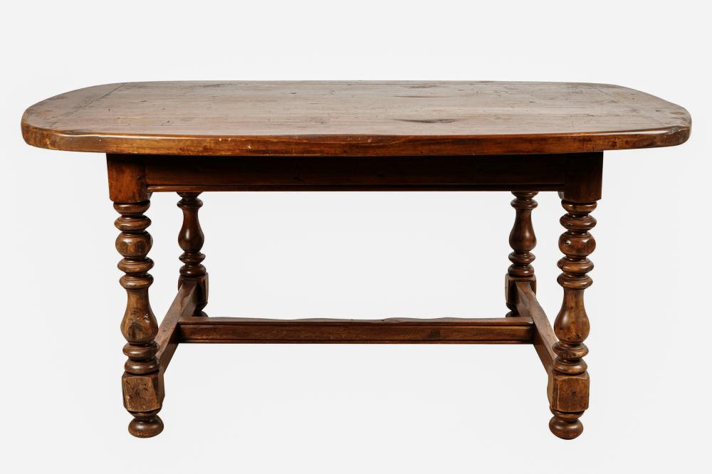 Appraisal: RUSTIC DINING TABLEthe slightly rounded rectangular top on turned legs