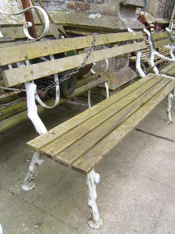 Appraisal: A Victorian garden bench with slatted timber seat raised on