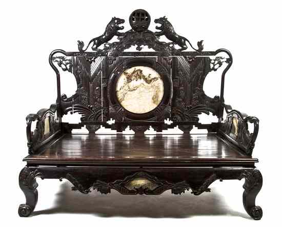 Appraisal: A Chinese Hardwood Opium Bed the back panel with two