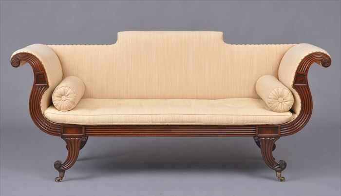 Appraisal: FEDERAL CARVED MAHOGANY SETTEE The padded back with raised roll-over