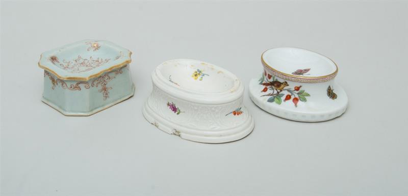 Appraisal: THREE PORCELAIN SALTS Comprising one Meissen with flower sprigs cracks