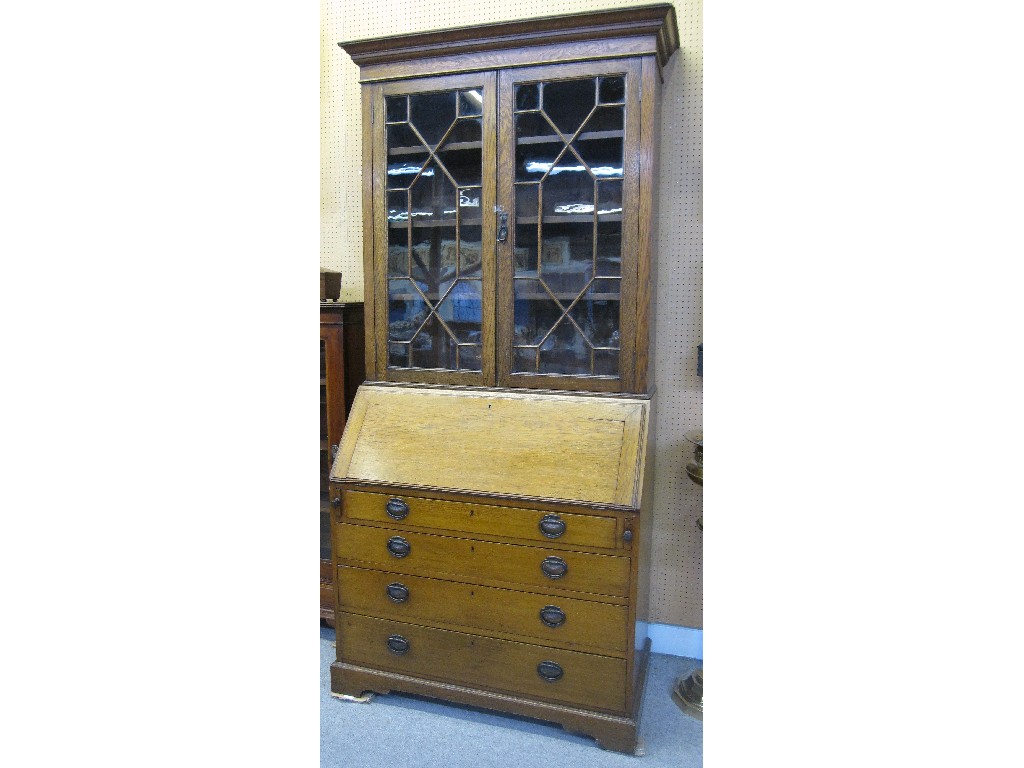 Appraisal: Edwardian oak bureau bookcase