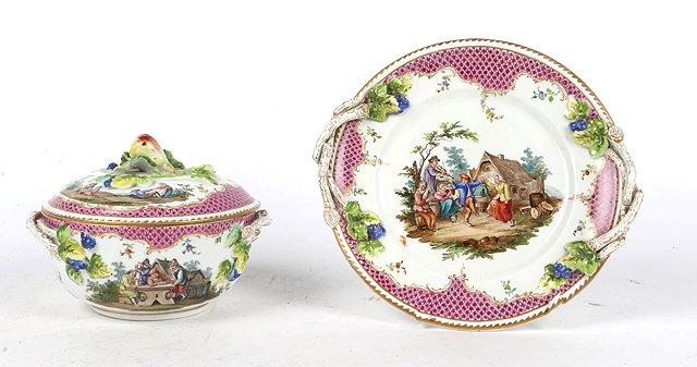 Appraisal: A CONTINENTAL PORCELAIN BOWL AND COVER ON STAND painted with