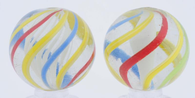 Appraisal: Lot Of English-Style Swirl Marbles Lot includes a white latticino