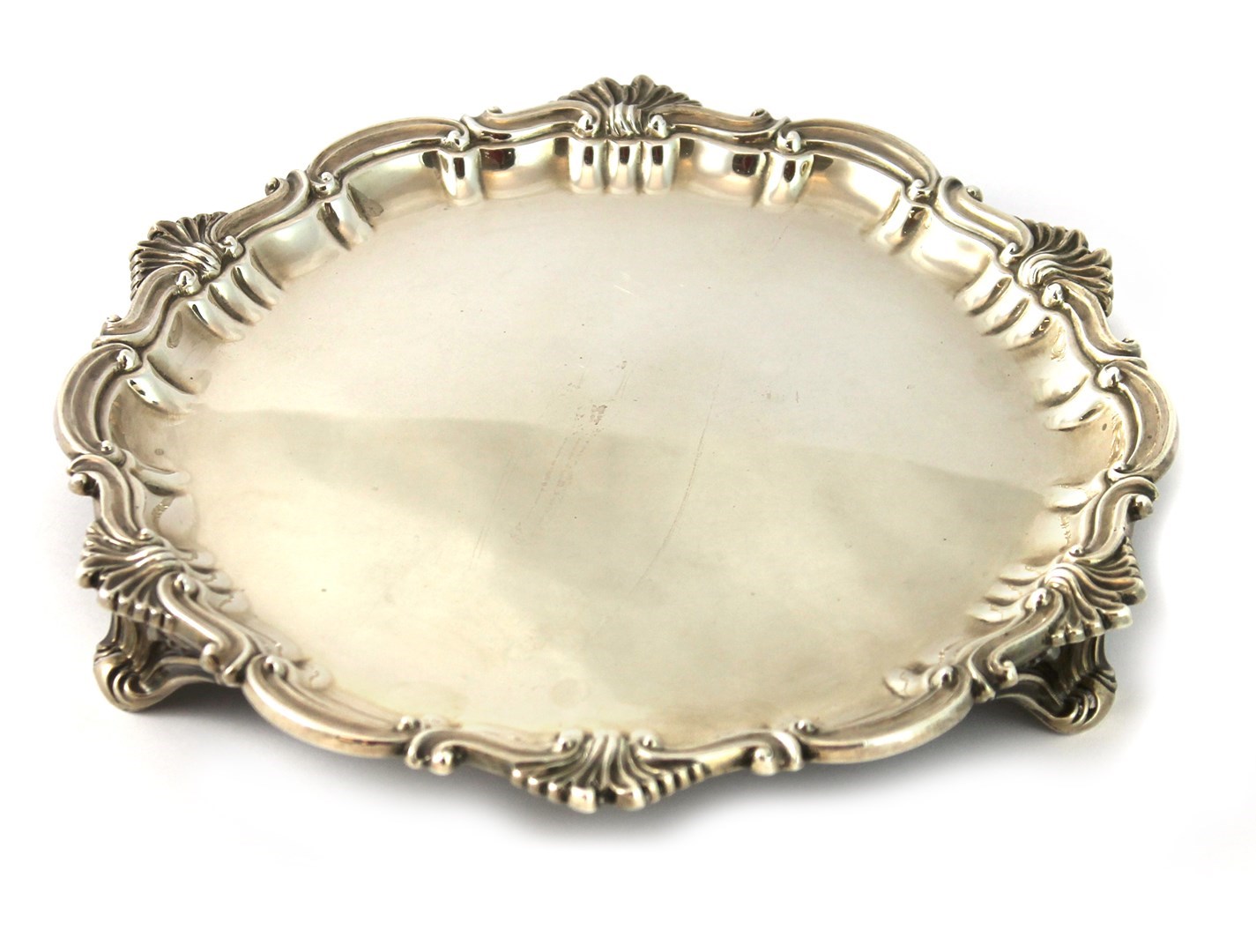 Appraisal: A silver salver of shaped circular form in the Chippendale