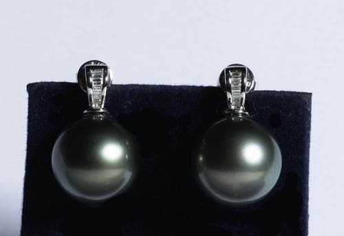 Appraisal: TAHITI PEARL AND BRILLIANT-CUT DIAMOND STUD EARRINGS White gold Decorative