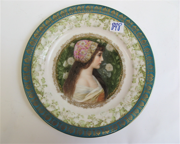 Appraisal: AUSTRIAN ART NOUVEAU PORCELAIN PORTRAIT PLATE of a young woman